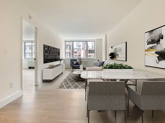 Renovated II North/South dining and living room with hard surface flooring