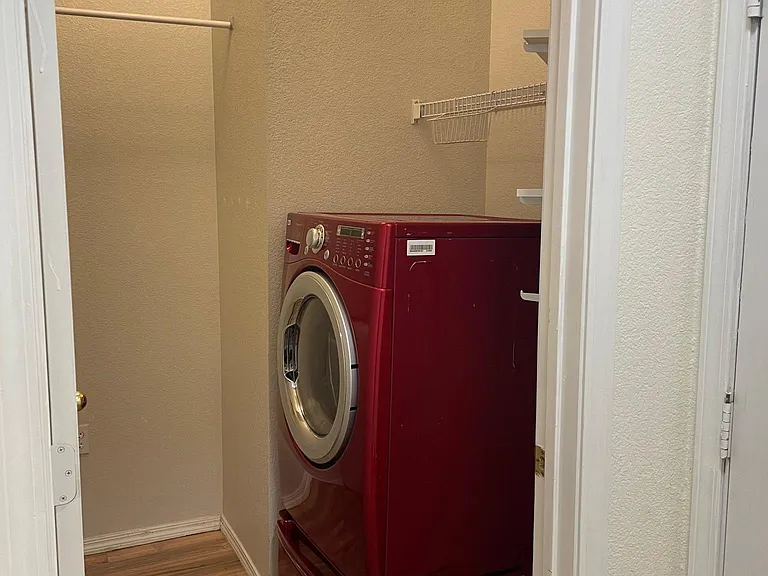 Laundry room has washer and dryer