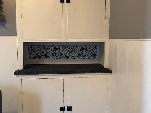 Restored built in cabinet with original hardware