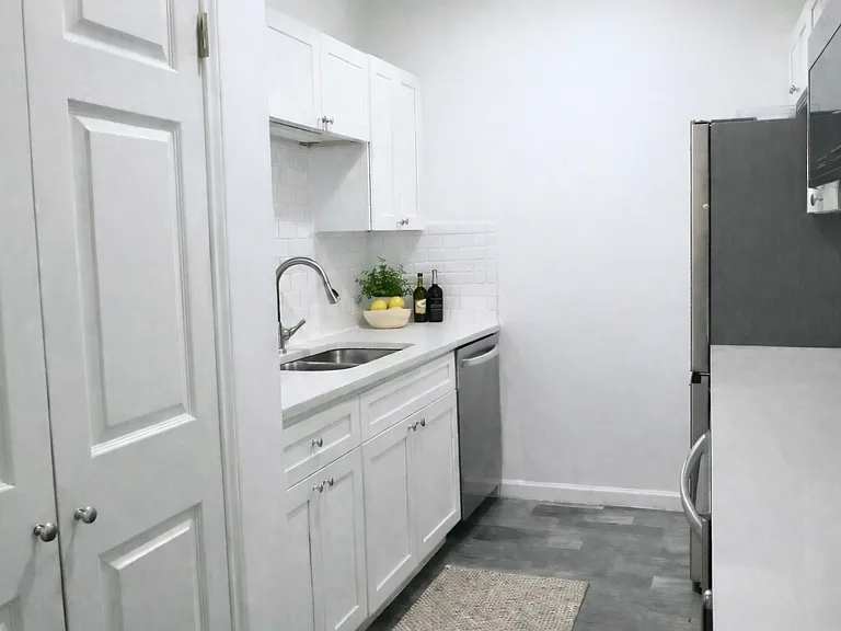 Beautifully Updated Kitchen with Quartz Countertops and Stainless Appliances *Virtually Staged*