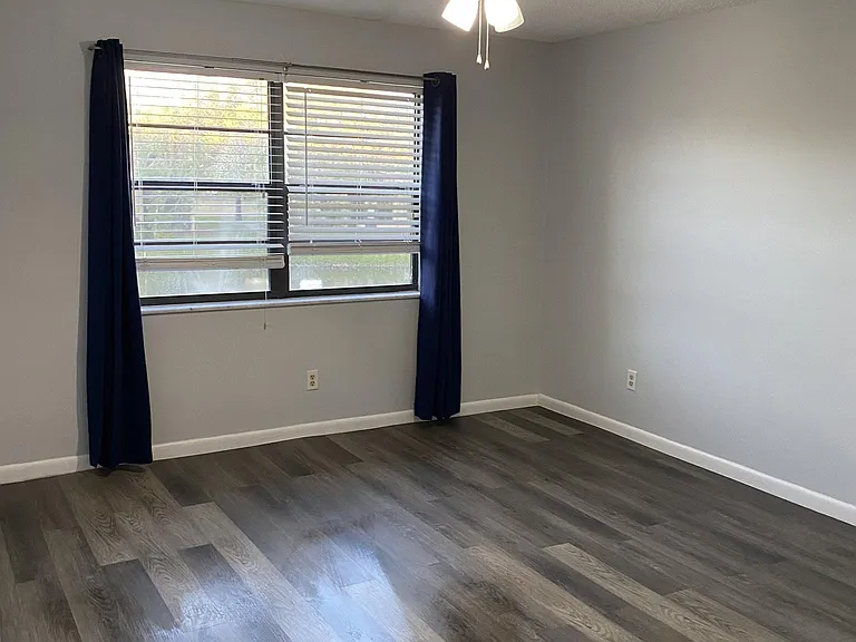 Bedroom with new LVF flooring