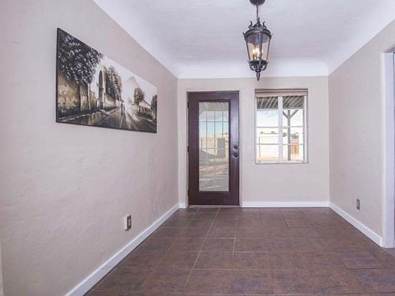dining room with backyard door