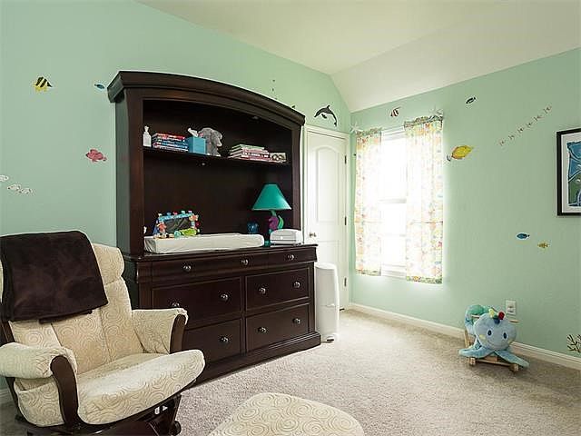 One of the 3, large bedrooms located upstairs.