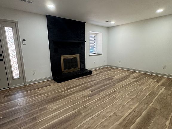Spacious Living Room with Fireplace