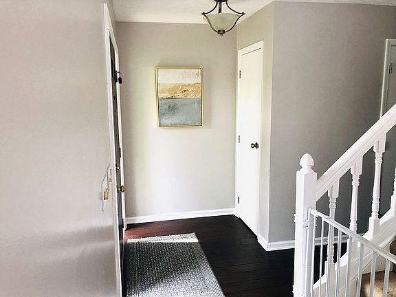 Front entry hall with closet