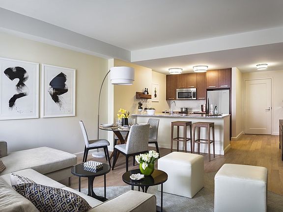 Experience premium brushed wide plank wood floors in your luxury rental apartment.