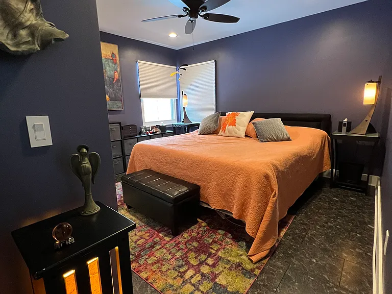main bedroom with lighted double closet
