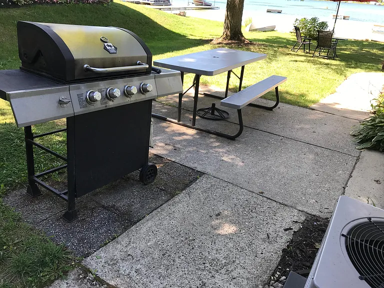 Grill and picnic table available.