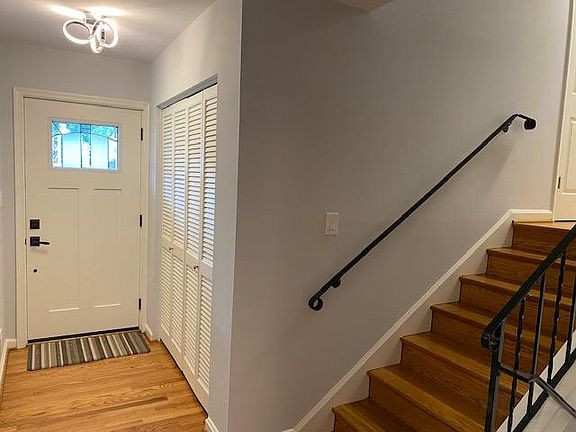 Front entrance and stair to upper level.
