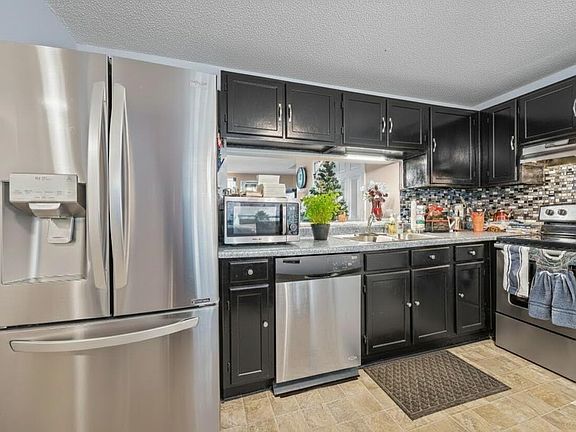 5th image of 7740 Sandra Ln