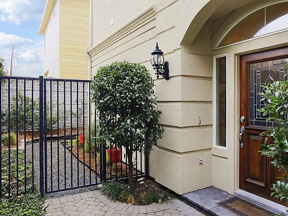 Private entry with gated patio area.