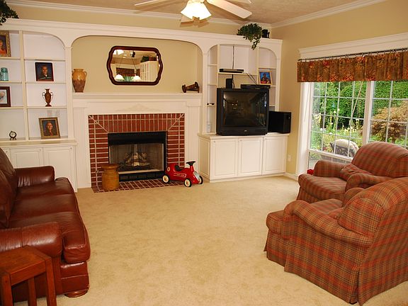 Family Room with Built ins and gas fireplace.