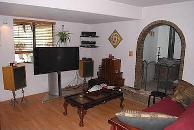 Living Room showing woodstove alcove.