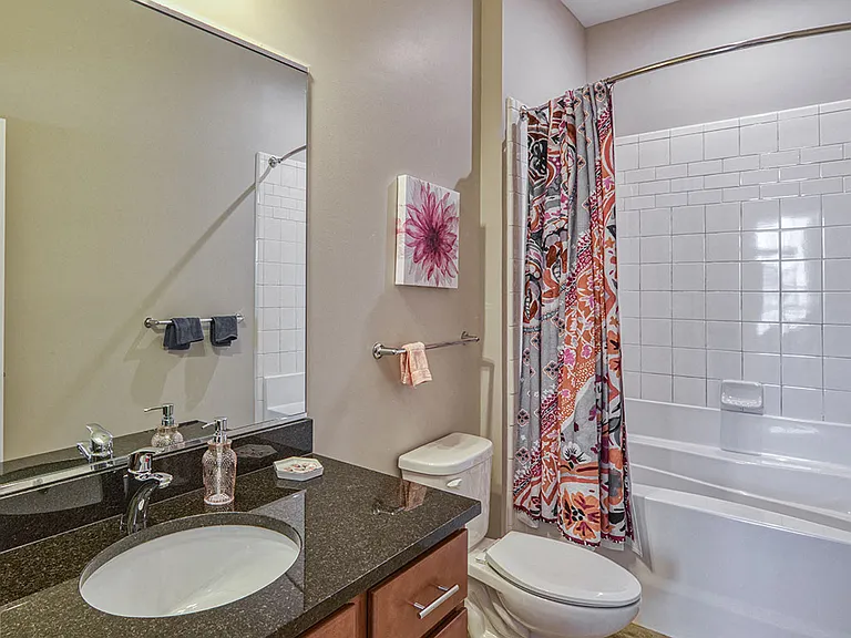 Granite, subway tiles and custom cabinetry