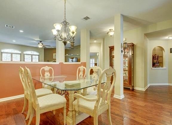 Formal dining room is separate from the other main areas of the home but still with an open feel.