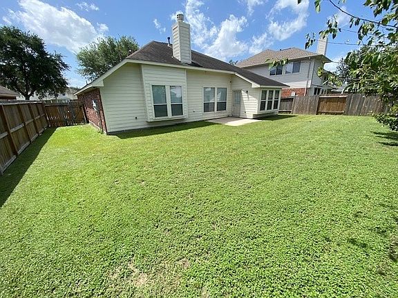 Rear Yard and Elevation of Home