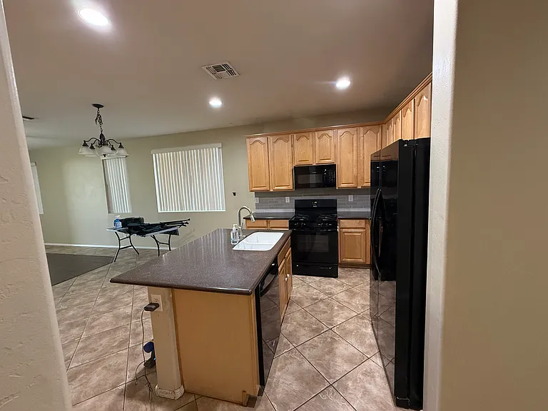 7711 S 68th Dr — Photo 10