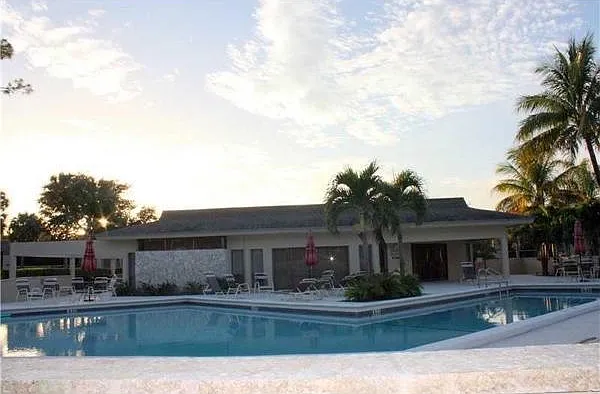 Large heated pool next to condo