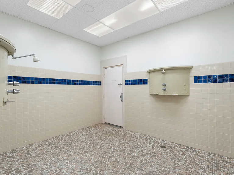 Locker room showers by the big pool