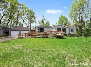 12150 Woodland Park Dr NE, Belding, MI 48809