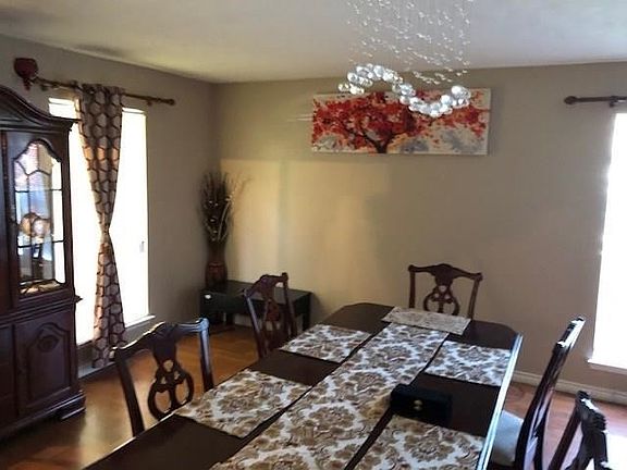 Huge Formal Dining Room With Plenty Of Natural Light.