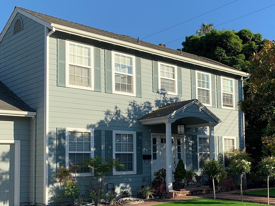 Front of house. 2-car garage.