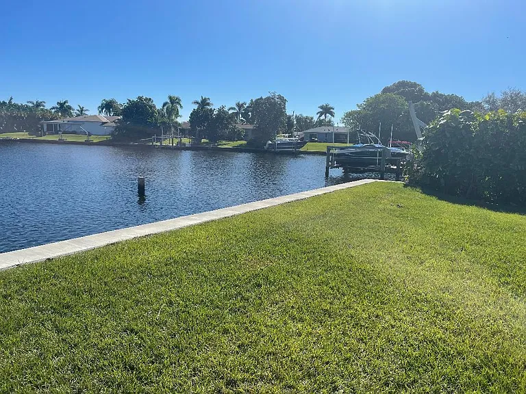 Right Side of Yard, Seawall, Lake View - 90 Foot Seawall