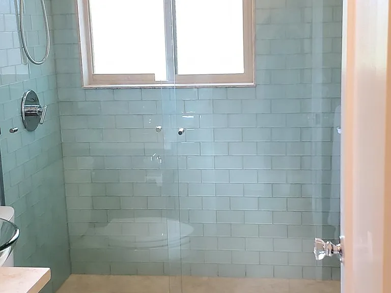 Beautiful oversized tiled shower in the upstairs bedrooms.