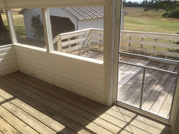 view of deck from screened in porch