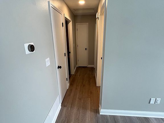 Hallway Leading to Bedroom #1 to the Left, Bedroom #2 off to the Right, Bathroom off to the Right