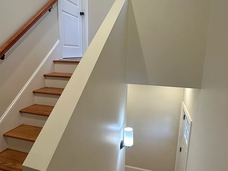Backdoor/stairs up to unit