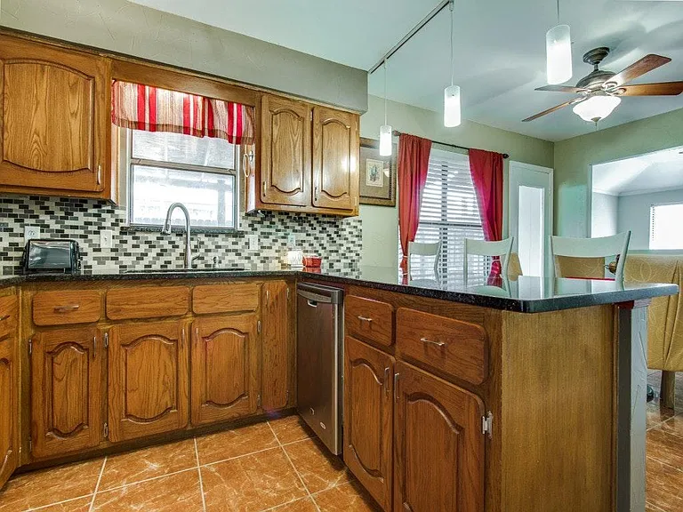 Modern and updated Kitchen with granite tops and stainless s
