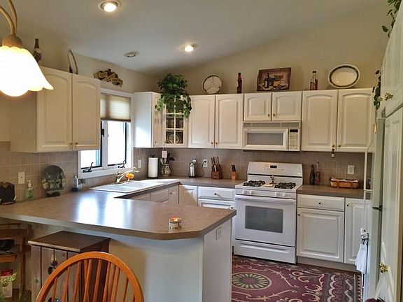 4th image of 9588 Club House Dr W