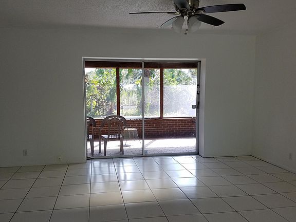 Living Room onto Brick and Cedar Screen Porch