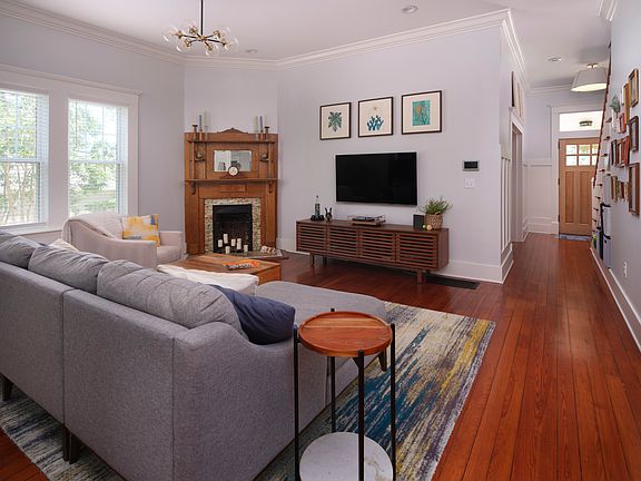 Living area with original fireplace