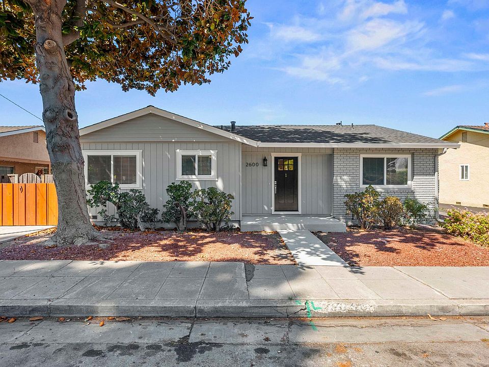 Street view - front of building and front door into unit