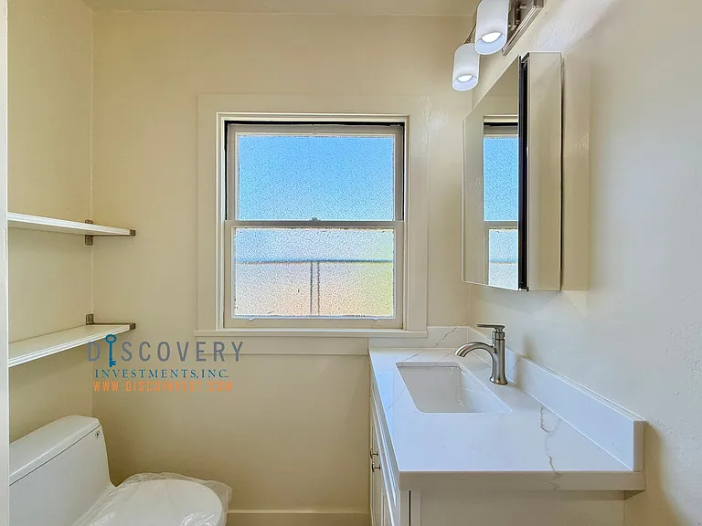 611 Clayton Ave — Photo 17