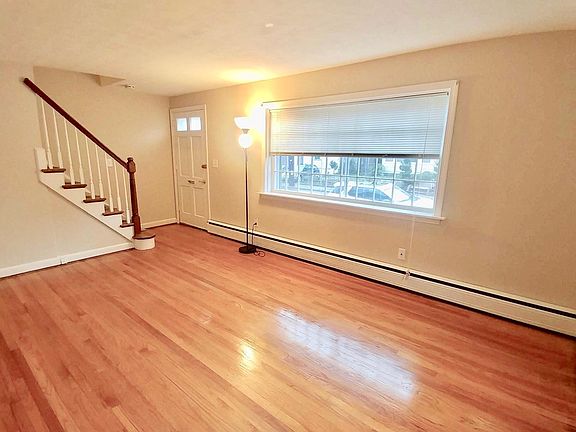 Living room with hardwood floors.