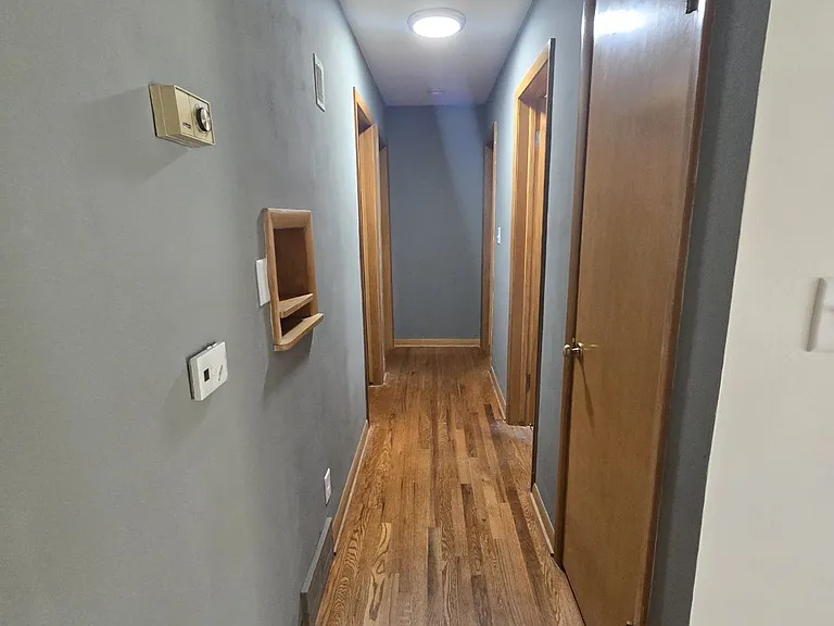 hallway to 3 bedrooms main floor