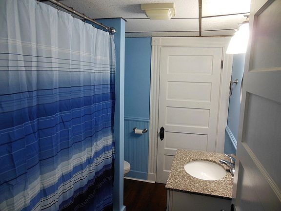 The bathroom has a new shower surround, new toilet and new brushed nickel hardware