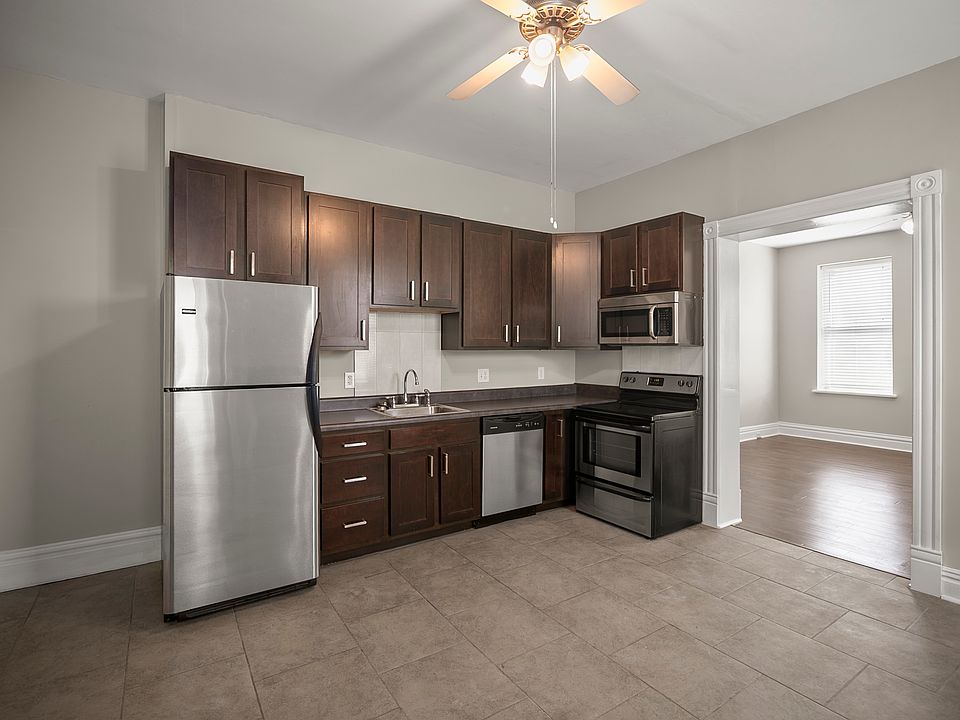 Updated kitchen at the center of the apartment