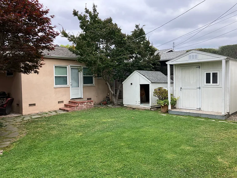 Backyard with playhouse