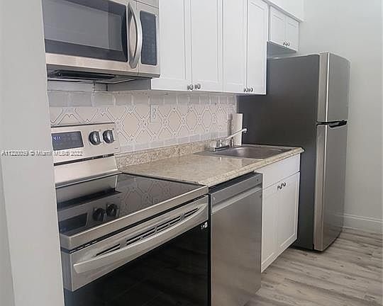 4th image of 7400 W 20th Ave APT 212