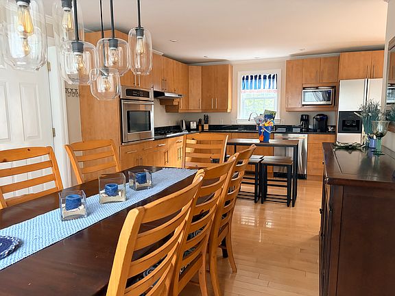 Dining opens to the kitchen. Enjoy cocktails and conversation while the chef prepares a delicious meal.