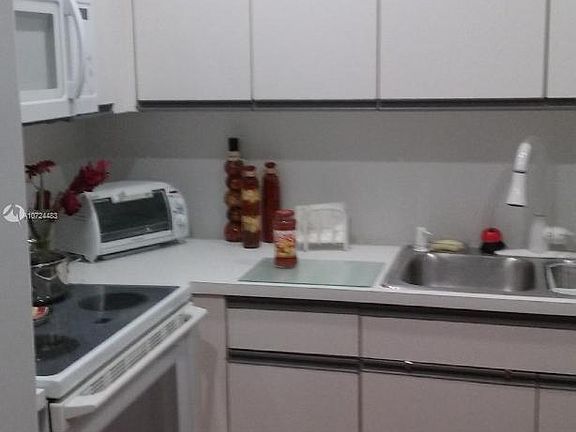 4th image of 13799 SW 147th Circle Ln APT 1-11