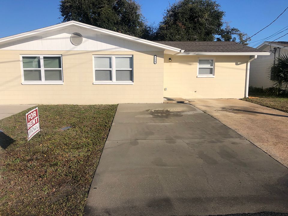 Front entrance and double driveway with space to park 2 large vehicles.