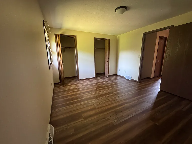 Back bedroom with 2 closets