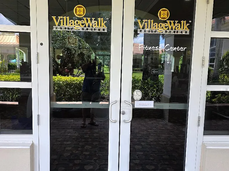 Village Walk Fitness Center. Lots of windows which overlook the scenic lake.