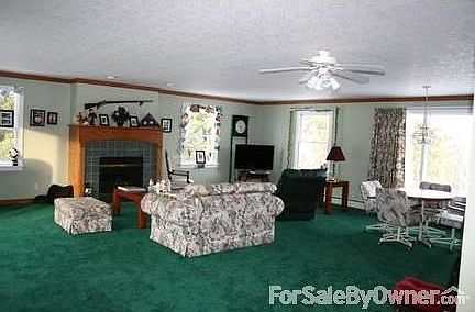 Family room (24 x 30) w gas fireplace						:						New plush carpeting. Fireplace can heat entire section. + 85 sqft Bar area.