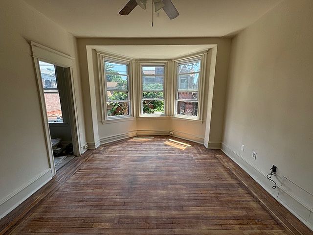 Living room, doorway to kitchen.